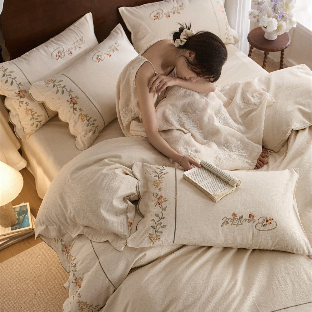 Embroidered Cotton-Linen Bedding Set with Wavy Hem and Floral Border Motif — product view 2