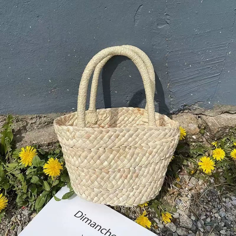 Handcrafted basket bag with double handles LoungeYard — product view 1