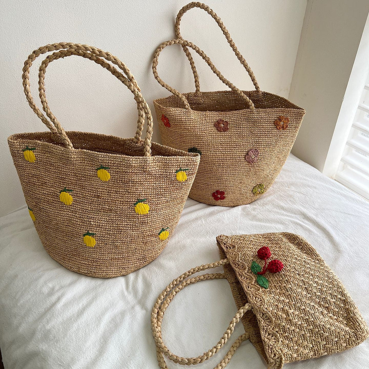 Handmade straw bag with colorful lemon design LoungeYard — product view 1