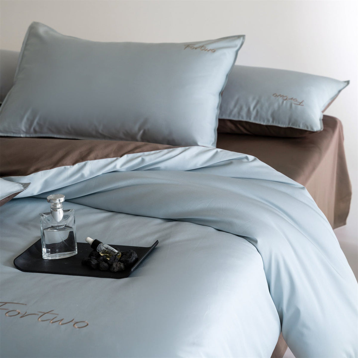 Reversible satin bedding set with fine tone-on-tone embroidery — product view 1