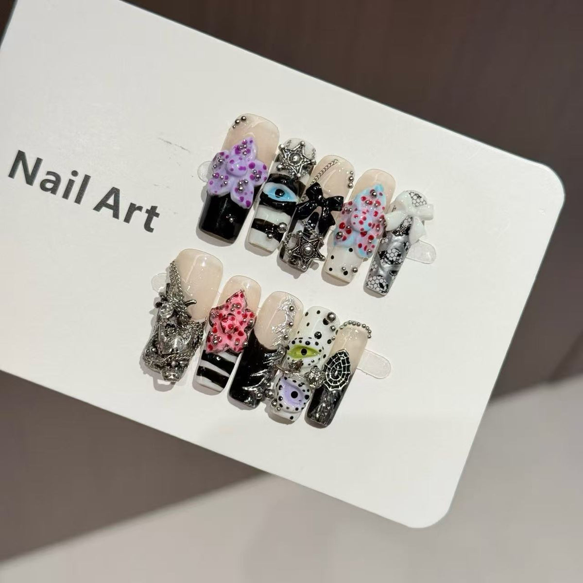 Artistic Press-On Nail Set with Unique Design Elements — product view 2