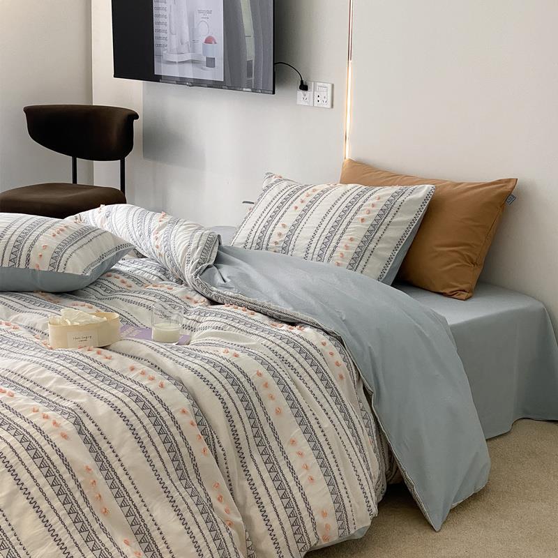 Striped bedding set made of cotton percale with embroidery dots and ties — product view 1