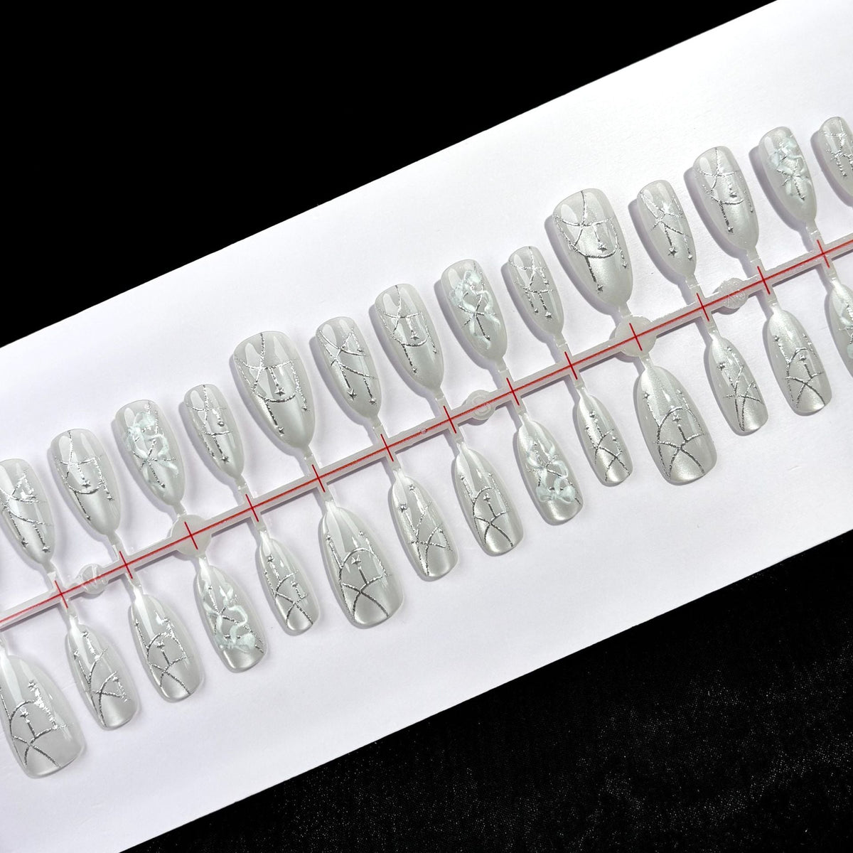 Decorative Press-On Nail Set with Elegant Silver Design — product view 2