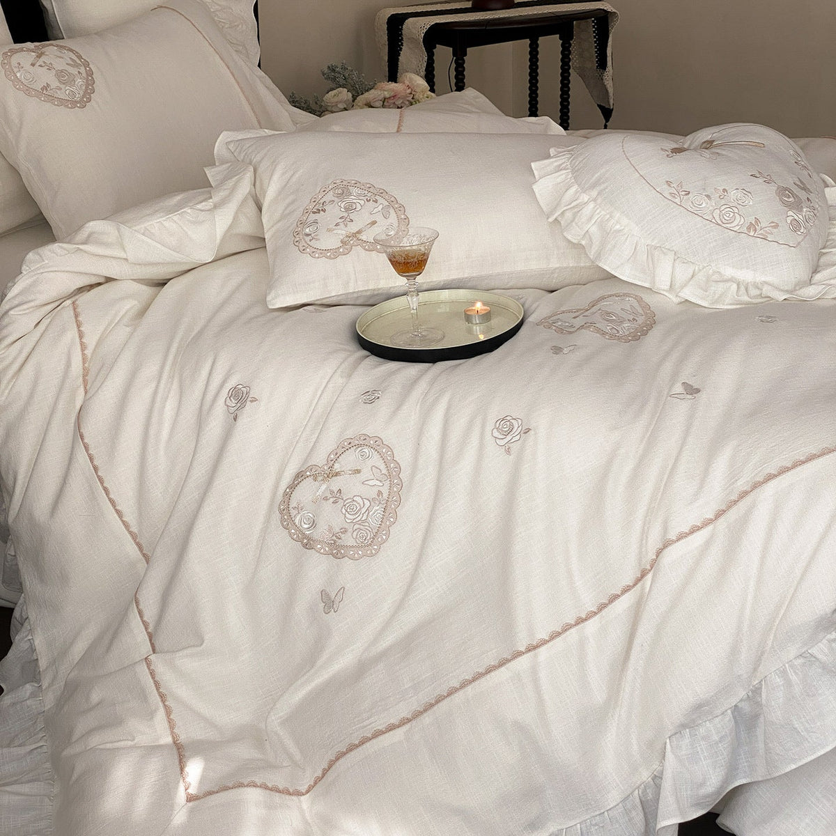 Romantic bedding set with ruffles, heart embroidery, and linen look — product view 1