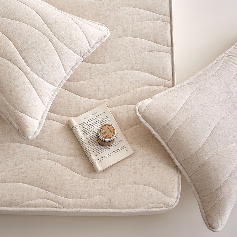 Quilted mattress topper with all-around fitted edge and breathable padding — product view 2