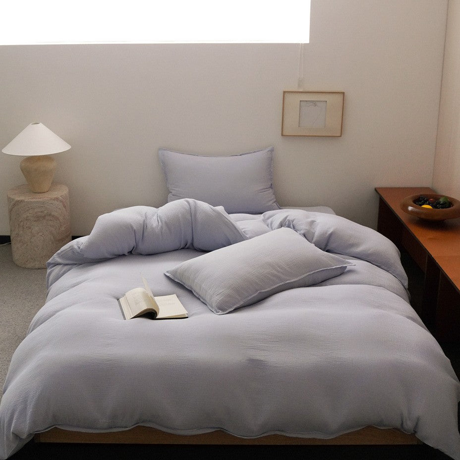 Checked cotton bedding set with soft percale texture and reversible pillowcases — product view 7