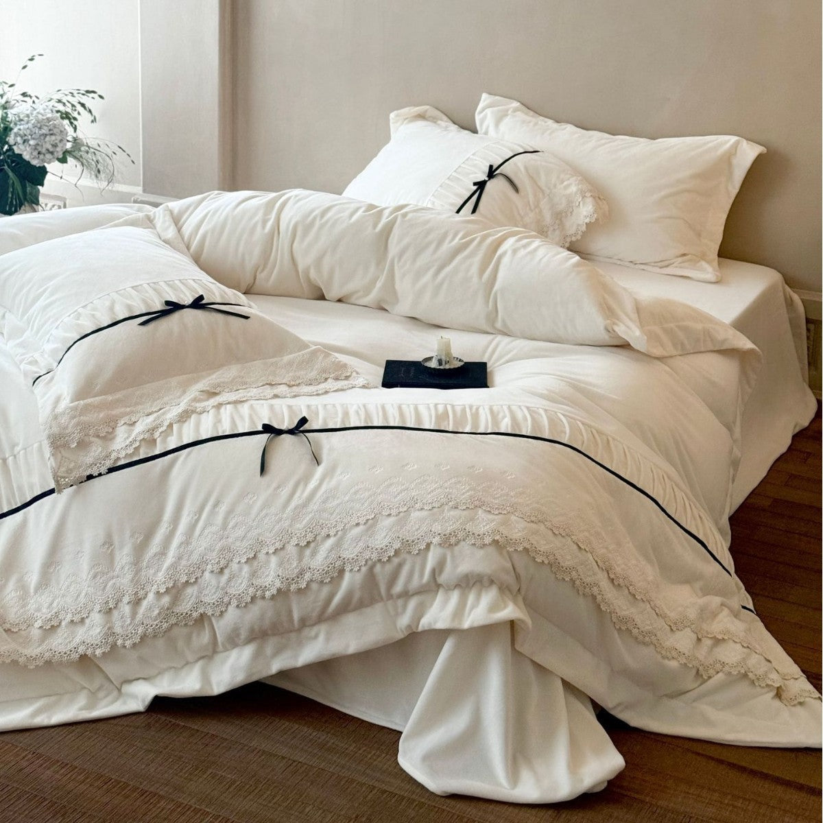 Romantic cotton satin bed linen set with ruffled hem, lace trim and decorative ribbons LoungeYard — product view 3