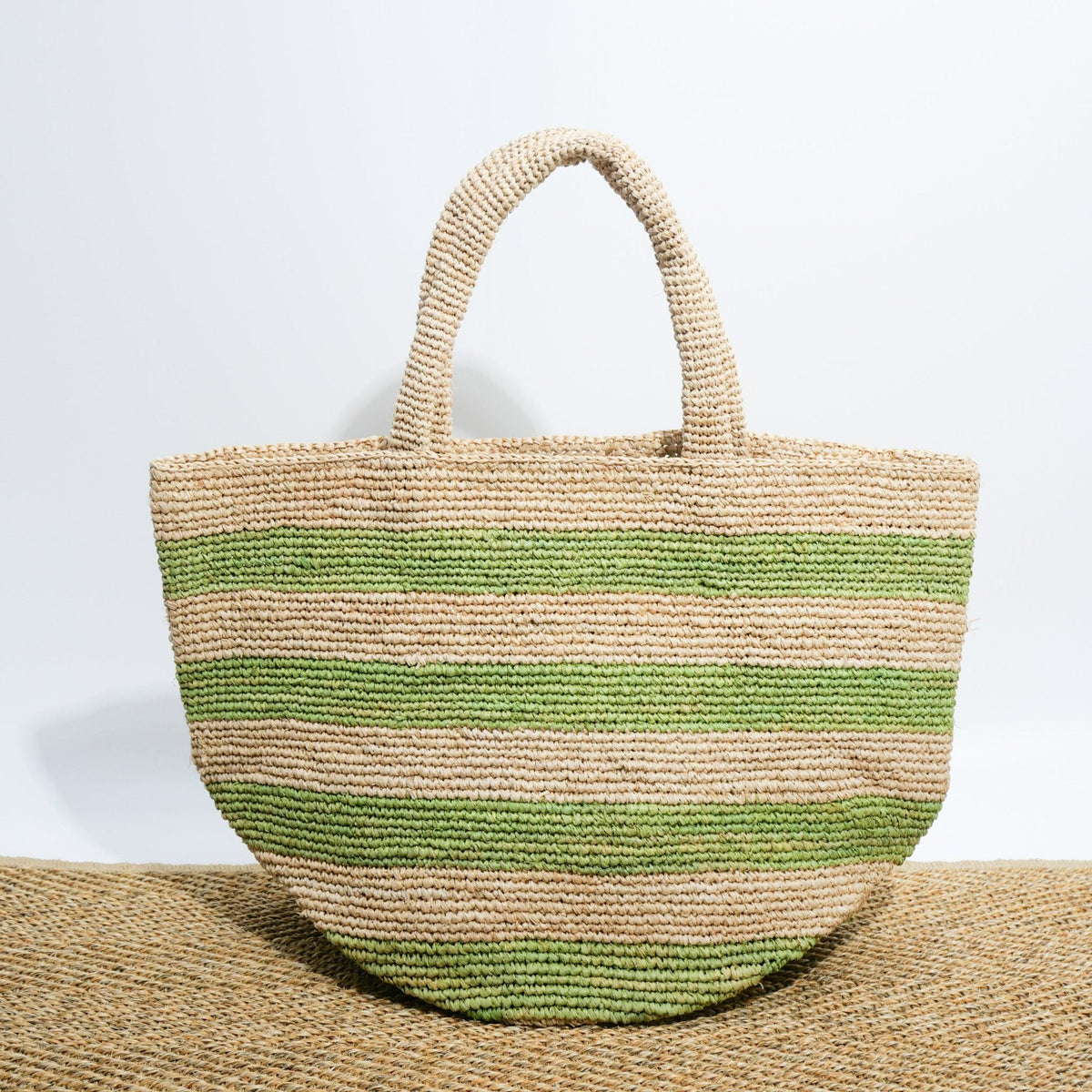 Handwoven beach bag in modern striped pattern LoungeYard — product view 5