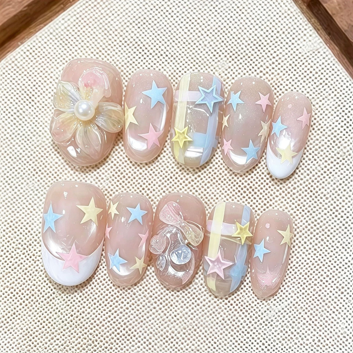 Artistic Press-On Nail Set with Star and Flower Designs — product view 1