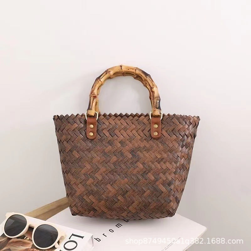 Handcrafted basket bag with bamboo handles LoungeYard — product view 6
