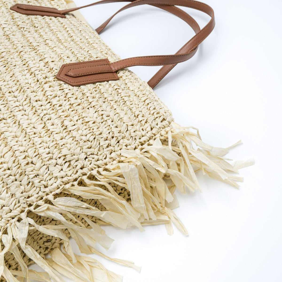 Beach bag made of handwoven straw with fringes LoungeYard — product view 3