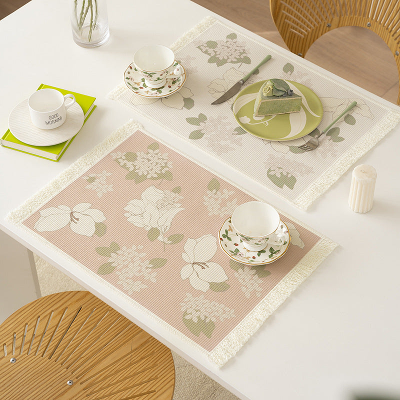 Floral woven bath mat with decorative fringes LoungeYard — product view 1