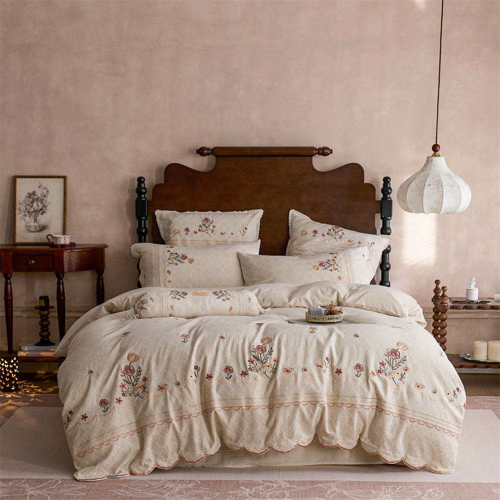 Luxurious embroidered cotton bedding set with ruffle and decorative pillow — product view 5