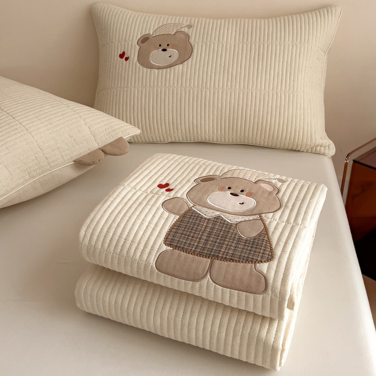 Quilted mattress topper with bunny applique and non-slip bottom — product view 1