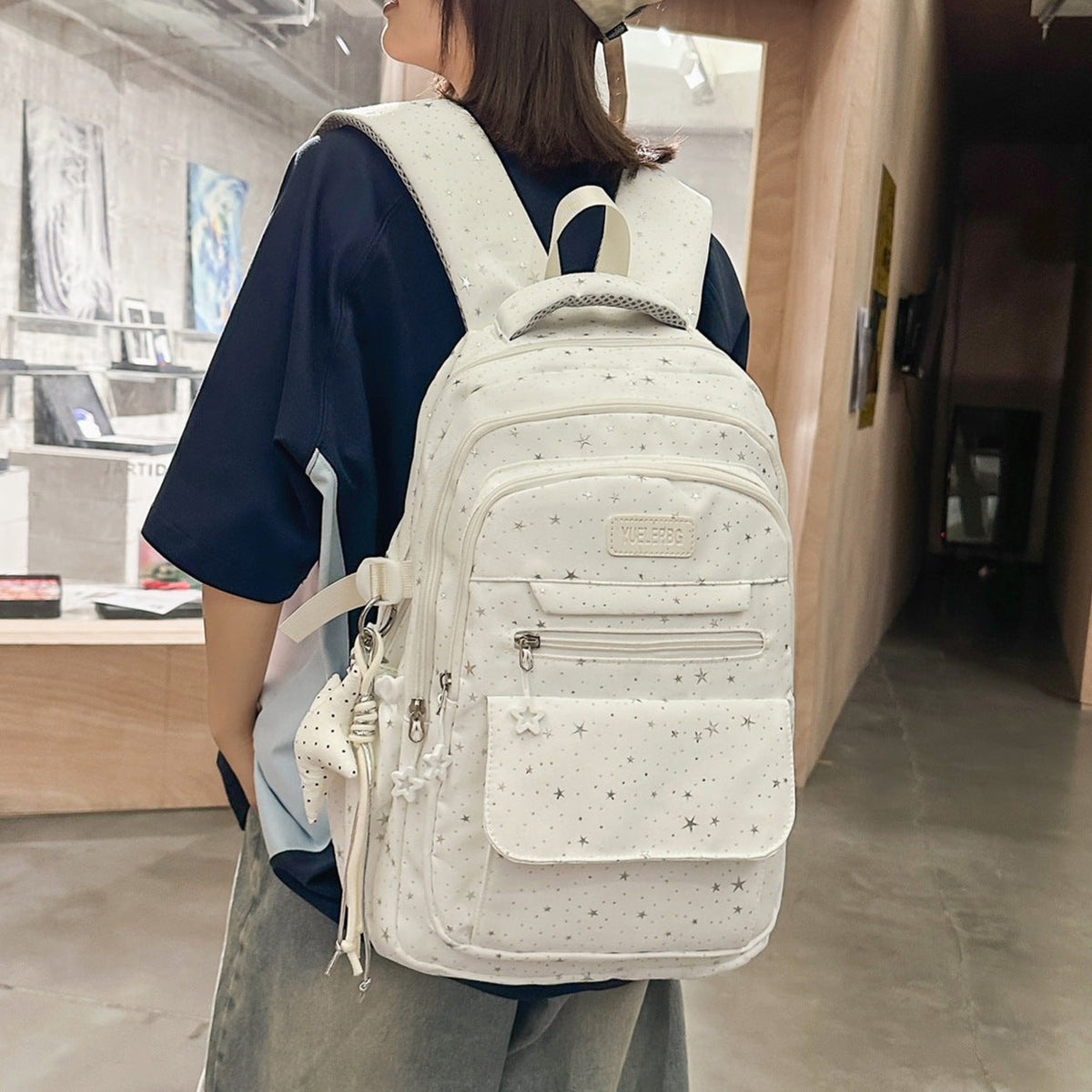 Star-Patterned Backpack with Multiple Compartments LoungeYard — product view 1