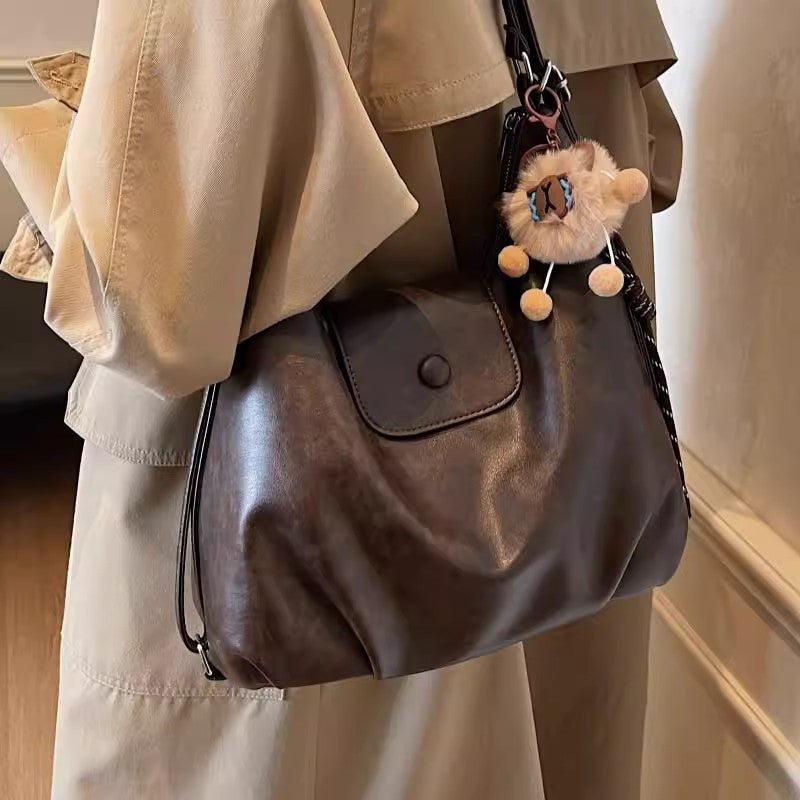 Modern shoulder bag with practical flap closure LoungeYard — product view 2