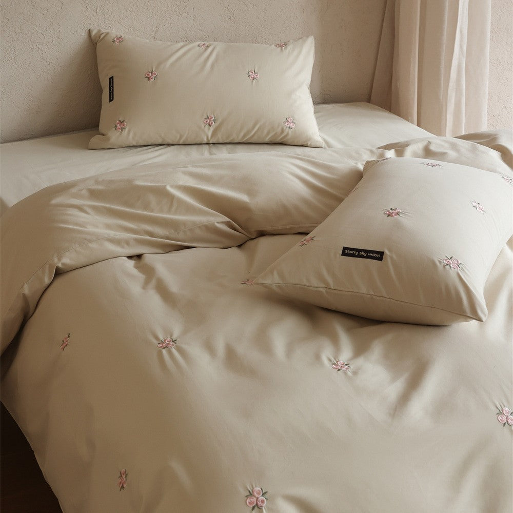 Embroidered cotton satin bedding set with subtle floral embroidery — product view 1
