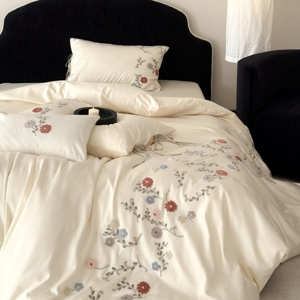 Luxurious satin bedding set with floral embroidery and pillowcases LoungeYard — product view 1