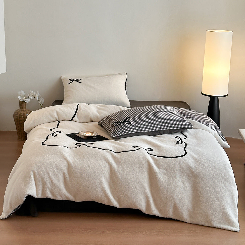 Reversible microfiber bedding set with plush surface, pom-pom corners, and paw embroidery — product view 6