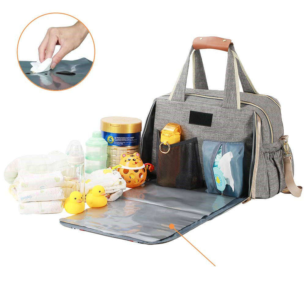 Ladies diaper bag with integrated changing mat LoungeYard — product view 1