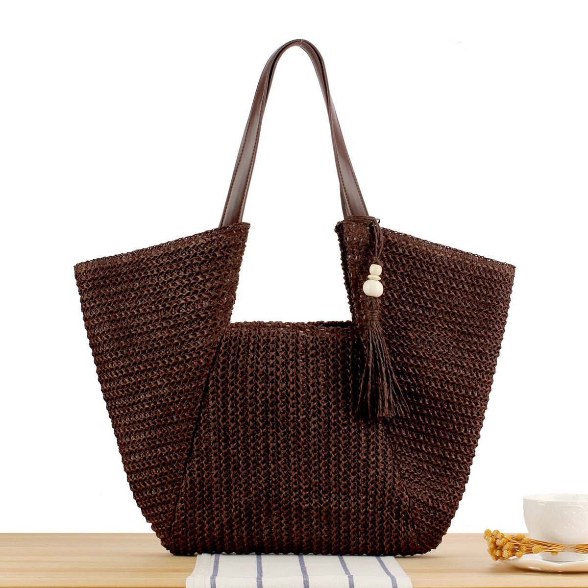 Beach bag made of natural weave with elegant leather accents LoungeYard — product view 6