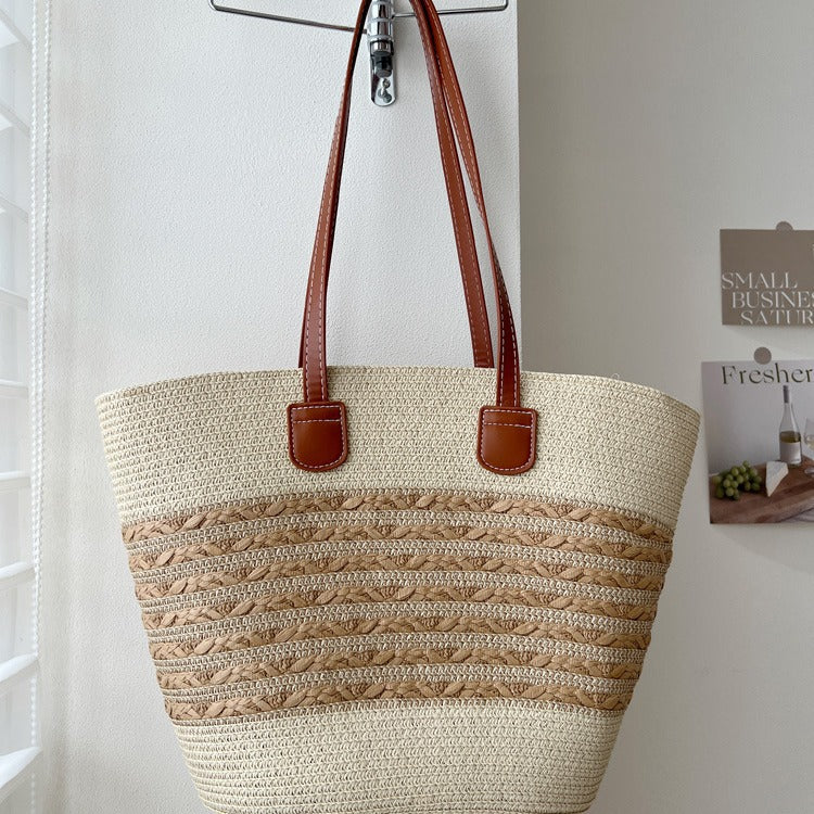 Handcrafted wicker bag with elegant leather accents LoungeYard — product view 2