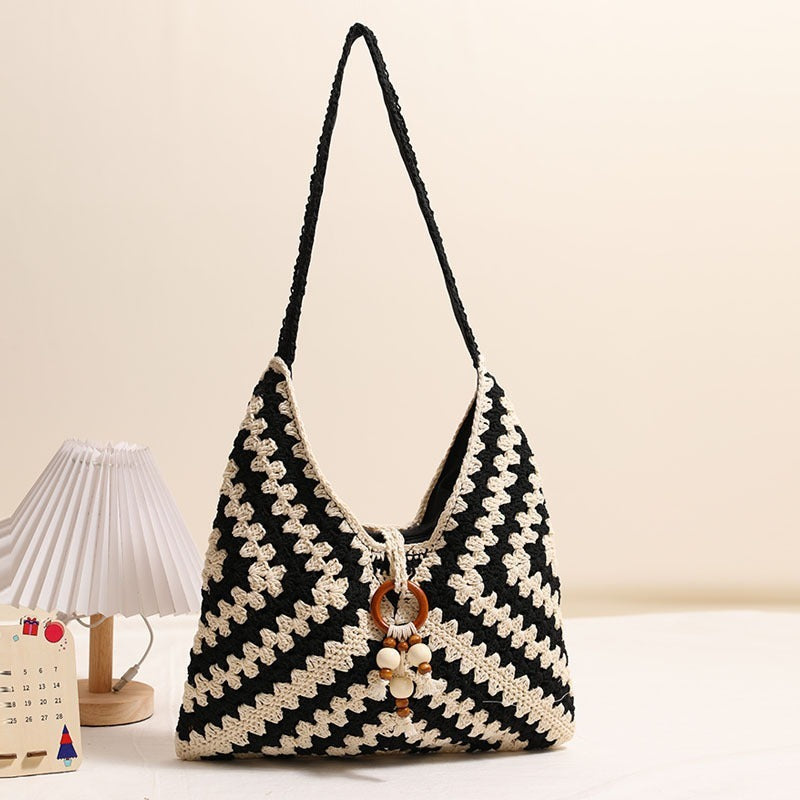 Handmade macrame shoulder bag with playful pendant LoungeYard — product view 3
