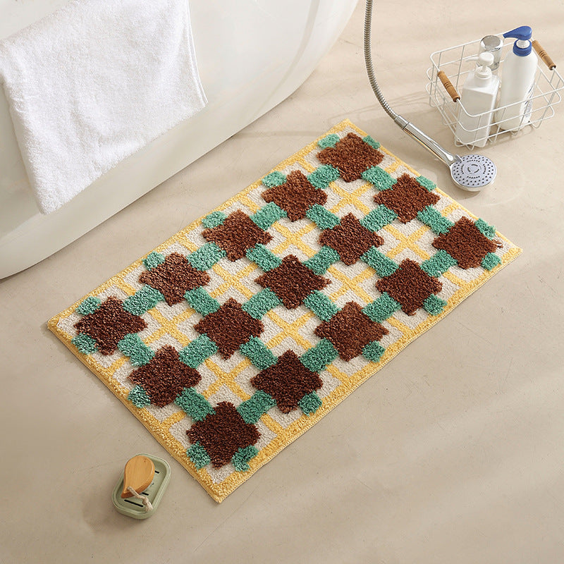 Hand-tufted bathroom bath mat with non-slip backing and textured square relief LoungeYard — product view 6