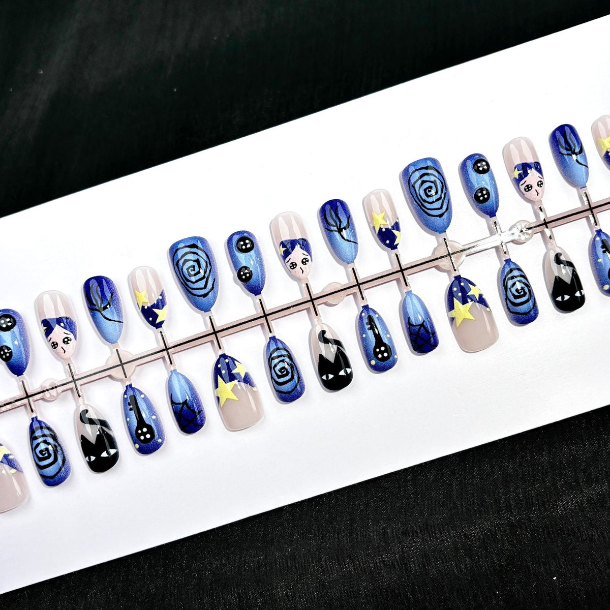 Artistic Press-On Nail Art Set with Celestial Motifs — product view 2