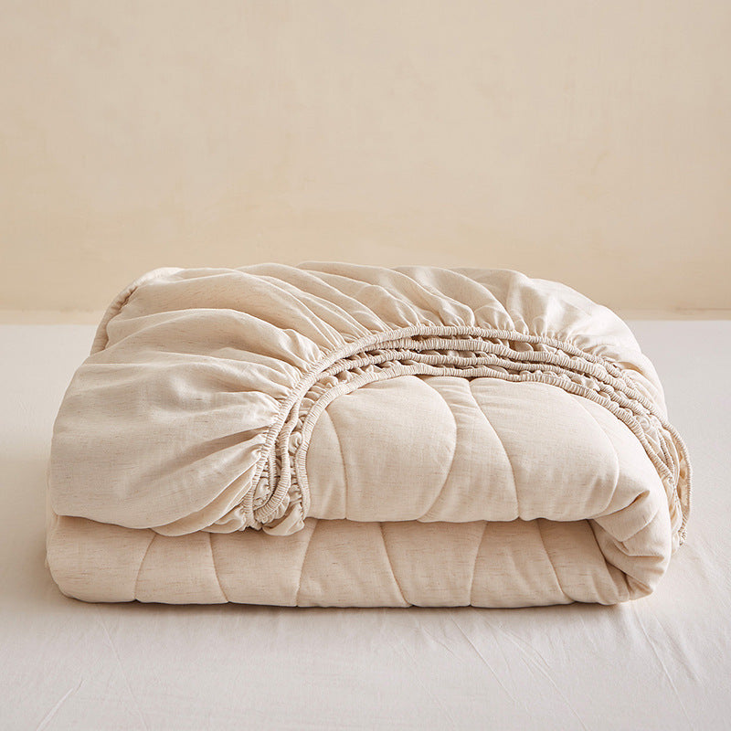 Quilted mattress topper with all-around fitted edge and breathable padding — product view 3