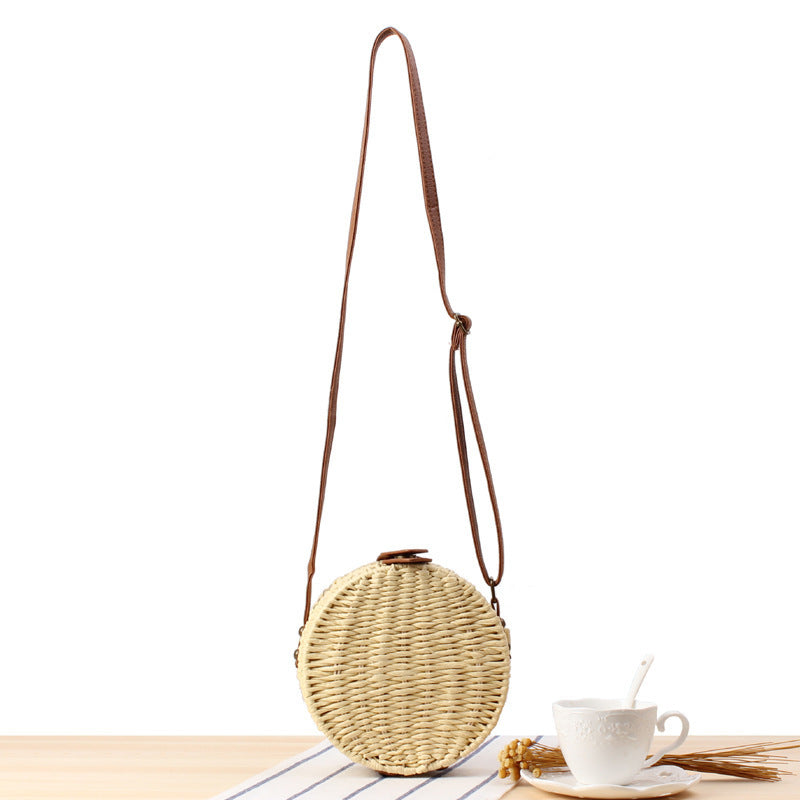 Round basket bag with leather accents LoungeYard — product view 1