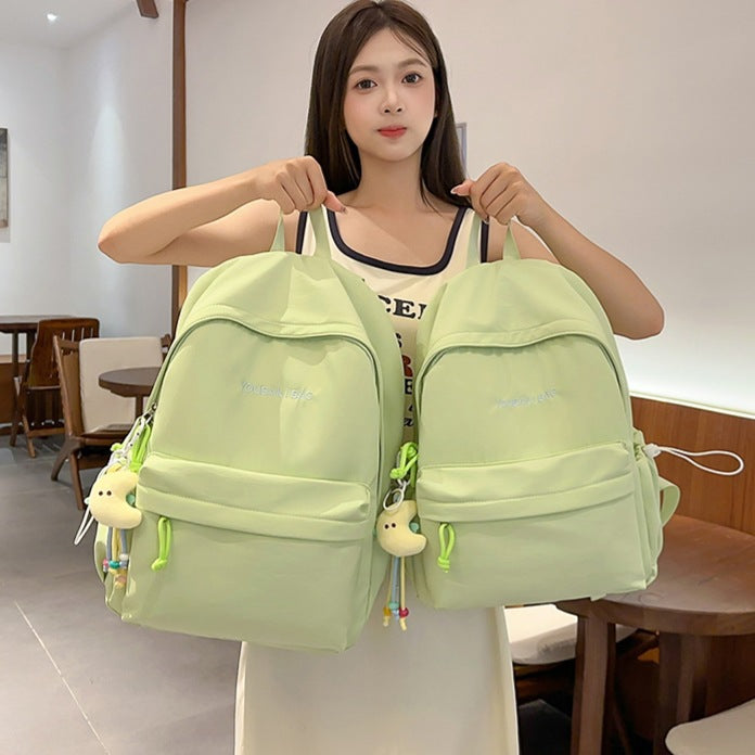 Lightweight Casual Backpack with Decorative Keychain LoungeYard — product view 1