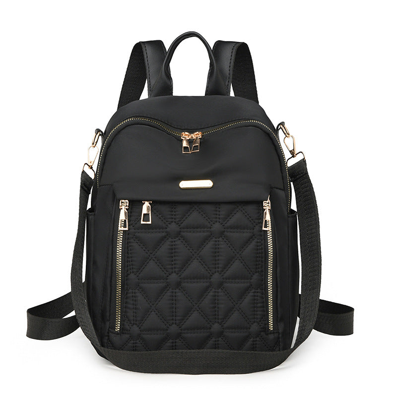 Elegant backpack bag with structured design and practical compartments LoungeYard — product view 1