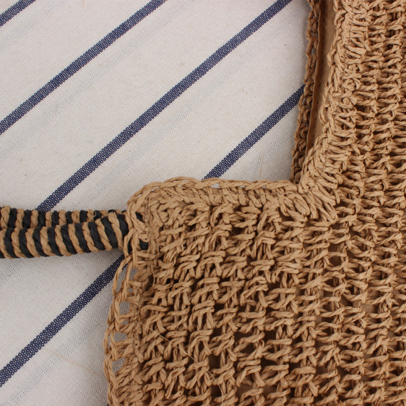 Handmade straw shoulder bag with structured design LoungeYard — product view 3