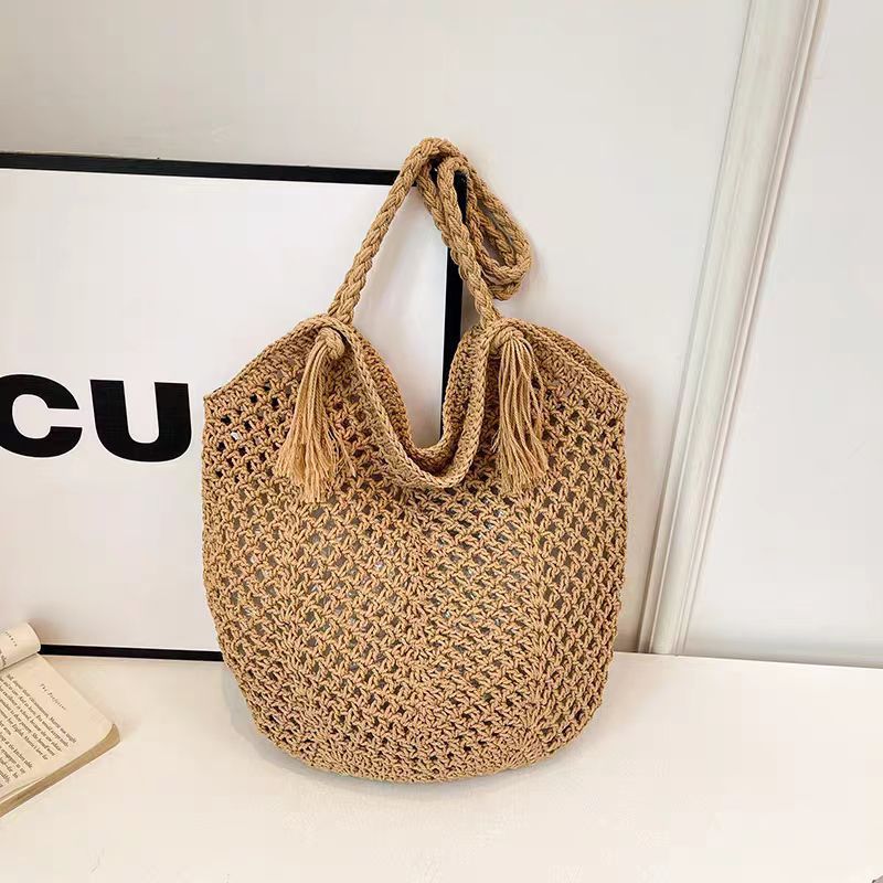 Handcrafted straw bag with tassels LoungeYard — product view 7