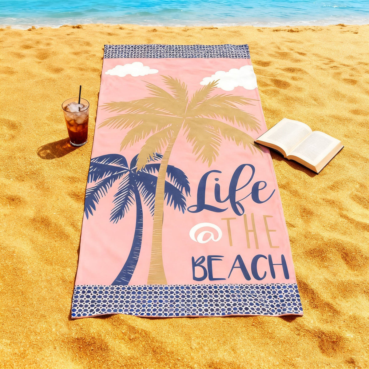 Beach towel with tropical palm leaf pattern LoungeYard — product view 1