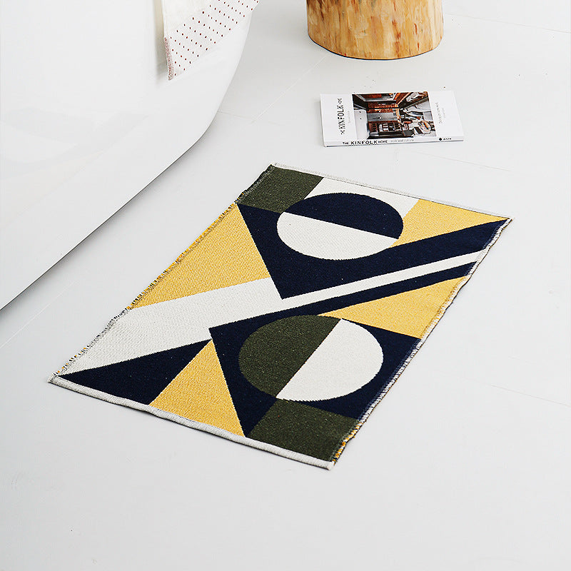 Modern geometric bathroom rug made of flat-woven cotton with non-slip backing LoungeYard — product view 1