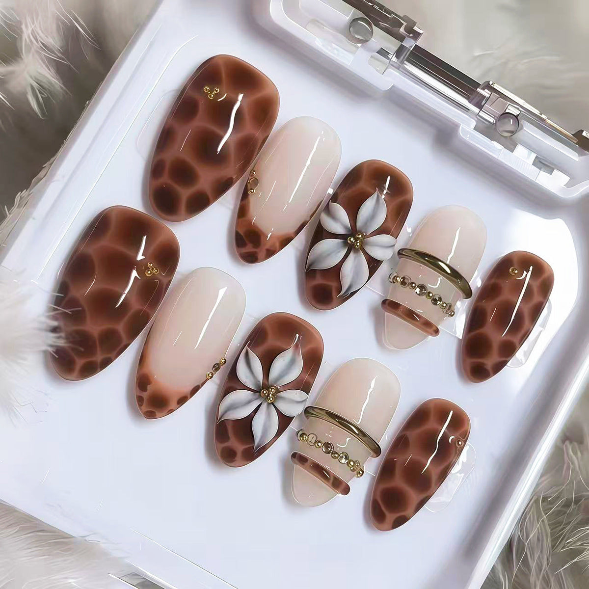 Artistic Press-On Nail Set with Floral Accents — product view 1