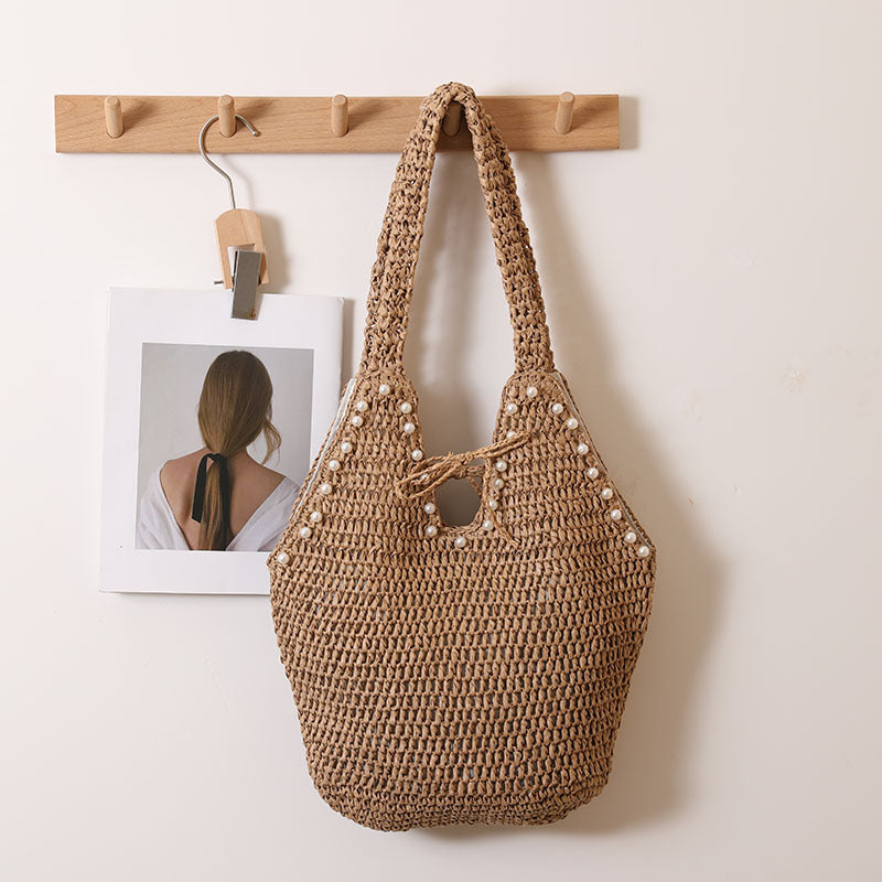 Handbag with pearl decor and innovative closure LoungeYard — product view 1