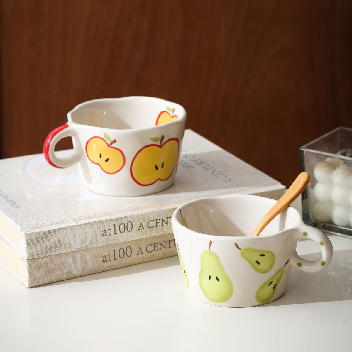 Ceramic mug with hand-painted banana illustration and round handle — product view 2