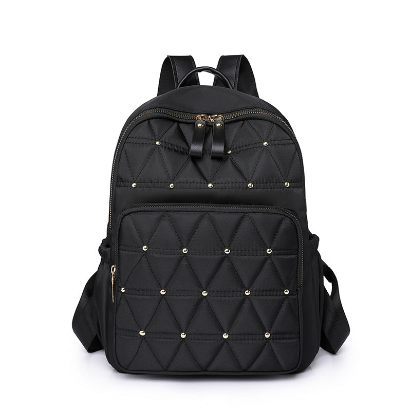 Stylish Quilted Backpack with Gold Accents — product view 1