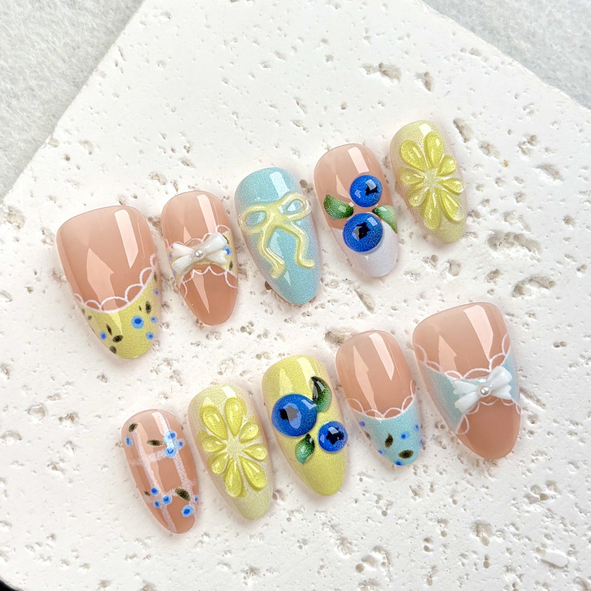 Decorative Press-On Nail Art Set with Floral and Bow Accents — product view 3