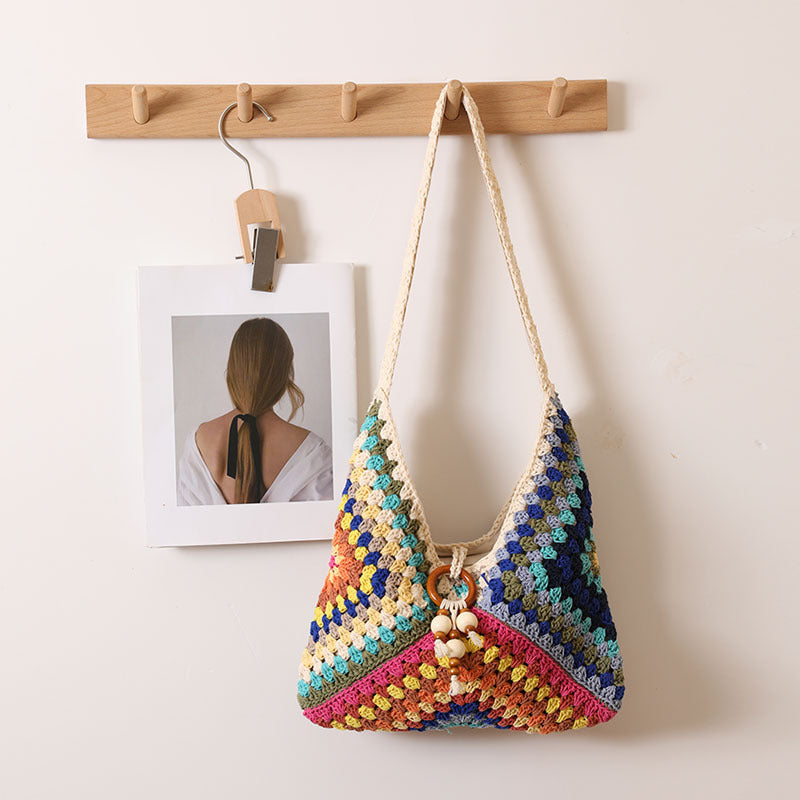 Handmade macrame shoulder bag with playful pendant LoungeYard — product view 5