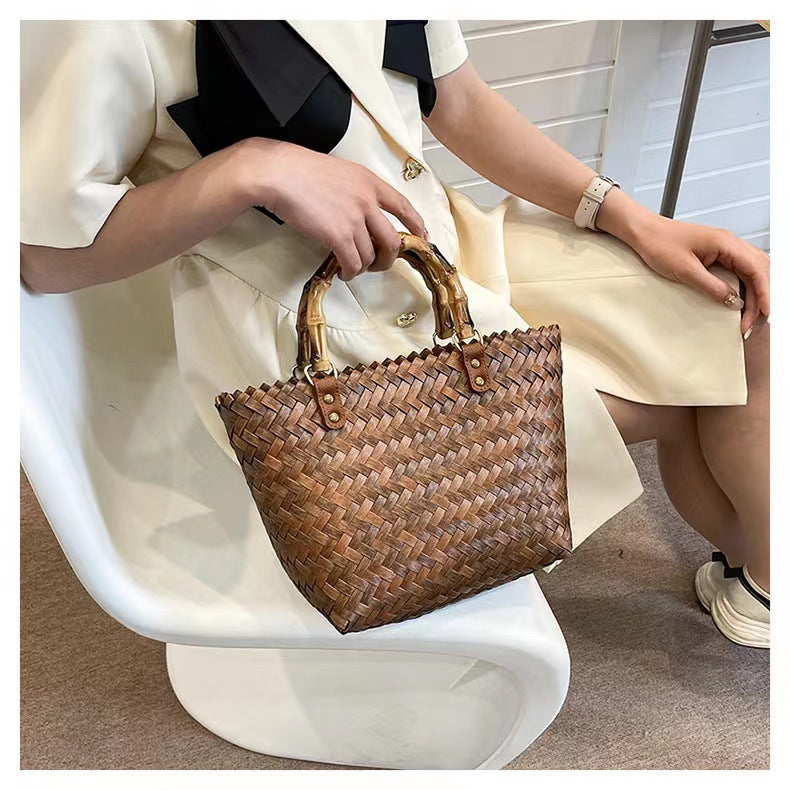 Handcrafted basket bag with bamboo handles LoungeYard — product view 1