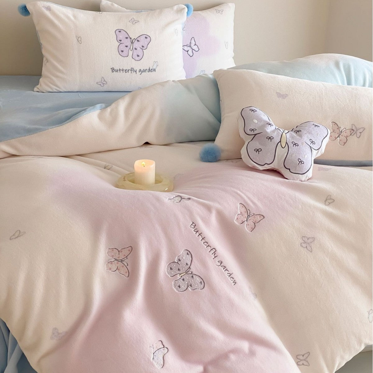 Children's bedding set with butterfly embroidery and pom pom details LoungeYard — product view 4