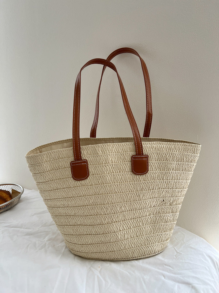 Handcrafted straw bag with elegant leather handles LoungeYard — product view 7