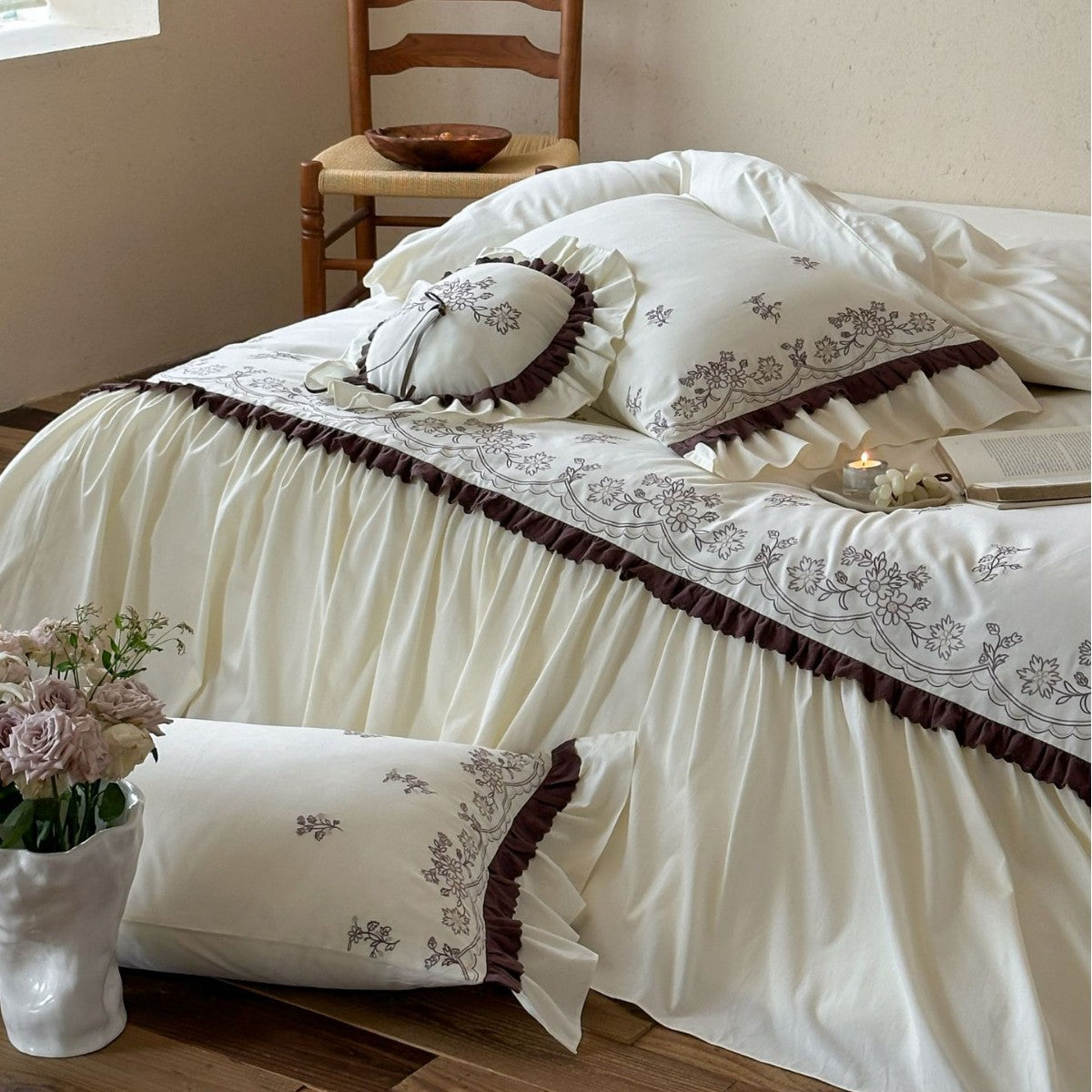 High-quality embroidered bedding set with ruffled bed skirt and decorative cushion — product view 1