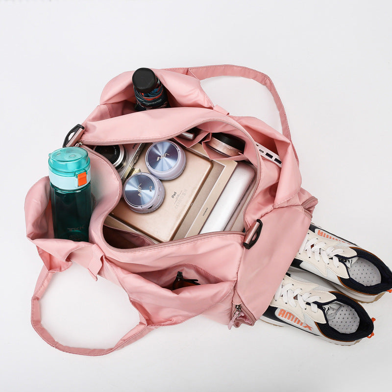 Sporty Weekend Bag With Ergonomic Carrying Handle And Versatile Compartment Setup LoungeYard — product view 2