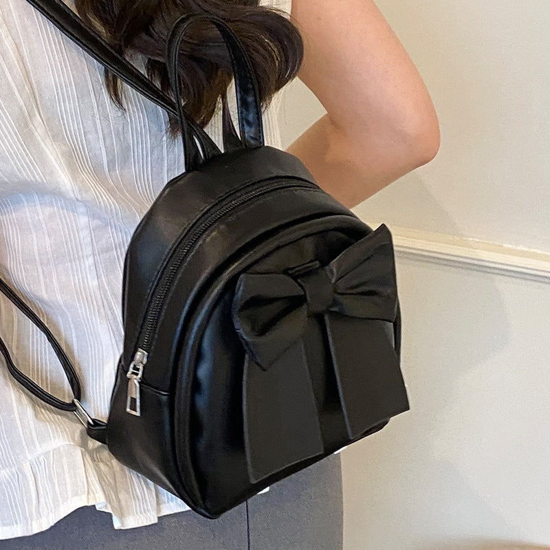 Bow-Accented Faux Leather Mini Backpack — product view 1