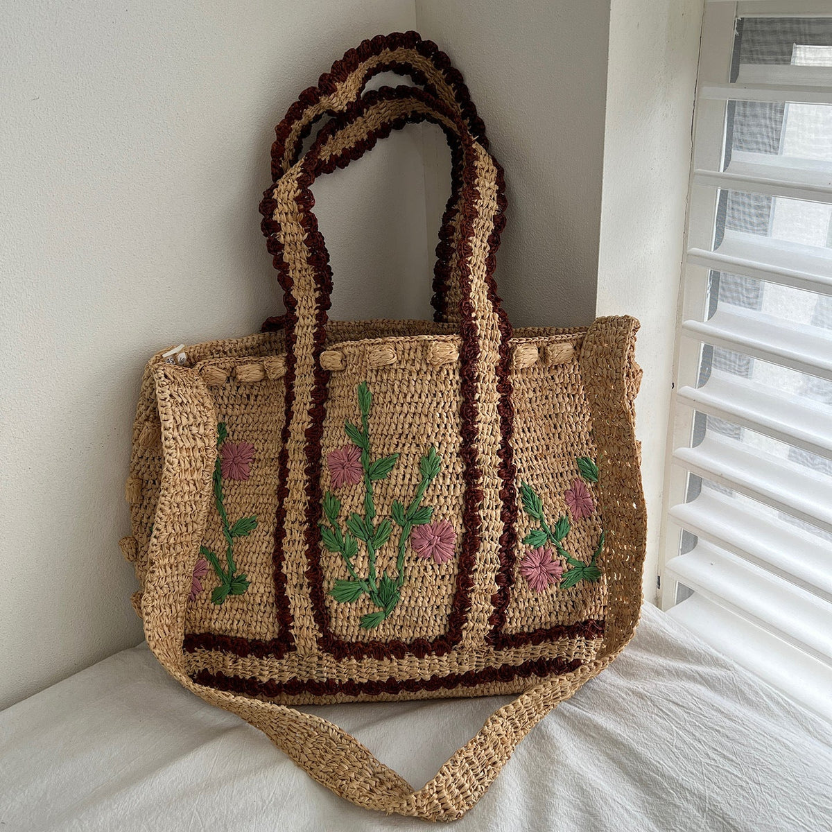 Braided shoulder bag with floral motif LoungeYard — product view 1